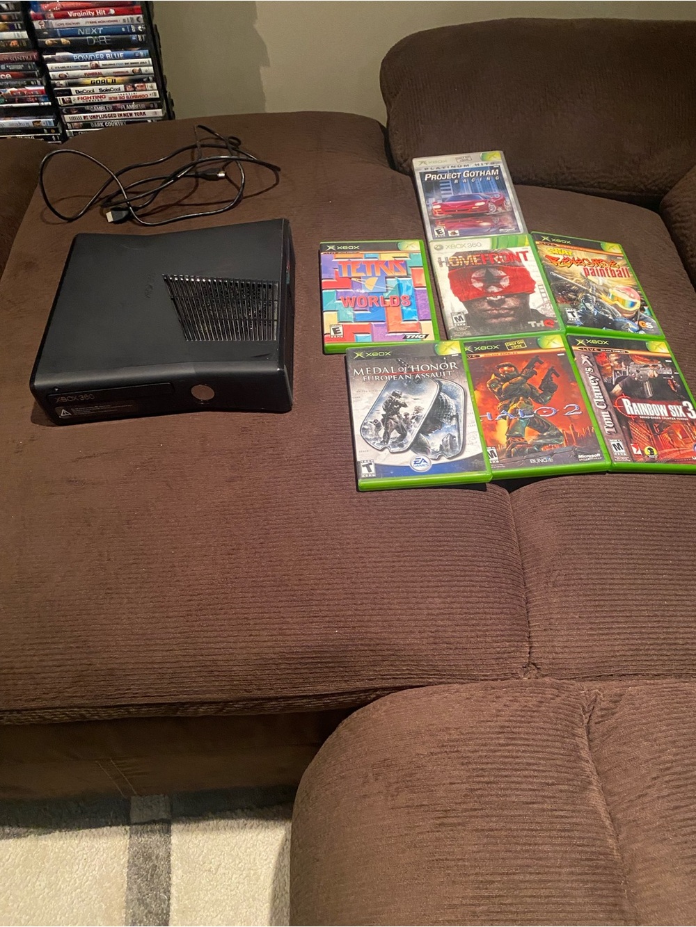 Microsoft Xbox 360 S Slim  Bundle with 7 Games. Missing power cord/controller